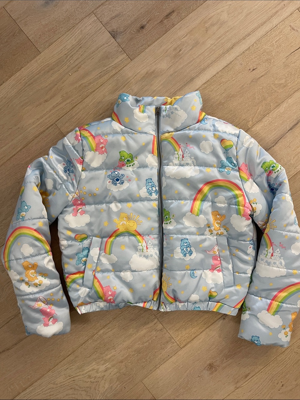 Care Bears Light Blue Rainbow Puffer Jacket women’s size Large